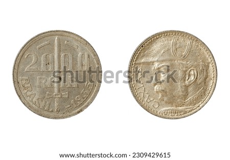 Brazilian silver coin of 2000 réis from 1935. Government of Getúlio Vargas. Sword and valor on reverse. Duque de Caxias, with cocked hat, Marshal Luiz Alves de Lima. Patron of the Brazilian Army. Royalty-Free Stock Photo #2309429615