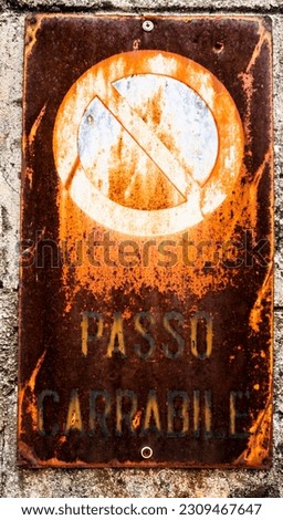 old sign faded by time that identifies a driveway in Vallonara Vicenza Veneto Italy