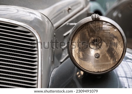 Headlight of old vintage car close-up