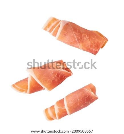 Parma ham prosciutto rolled up isolated on white background. Royalty-Free Stock Photo #2309503557