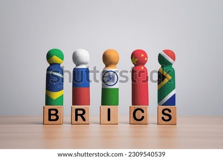 Brazil Russia India China and South Africa flag print screen on wooden figure for BRICS economic international cooperation concept. Royalty-Free Stock Photo #2309540539