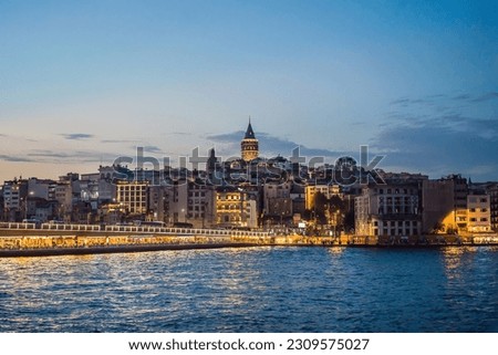 Istanbul city skyline in Turkey, Beyoglu district old houses with Galata tower on top, view from the Golden Horn Royalty-Free Stock Photo #2309575027