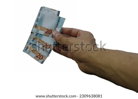 hand holding Jordanian dinar,Man with Jordanian money with the new 20 JD isolated on white background. Royalty-Free Stock Photo #2309638081