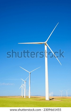 Wind turbine generators for sustainable electrical energy production Royalty-Free Stock Photo #2309661455