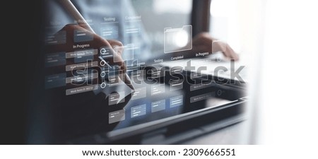 Business developer using Kanban board framework on digital tablet and laptop. Agile software development lean project management tool for fast changes, project management concept Royalty-Free Stock Photo #2309666551