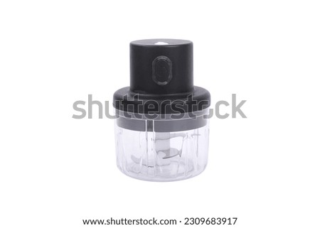 Mini Electric Chopper. The perfect kitchen tool for crushed garlic, crushed ginger, crushed fresh chili, crushed peanuts, ground meat, pumpkin paste, etc., Multifunction.  Royalty-Free Stock Photo #2309683917