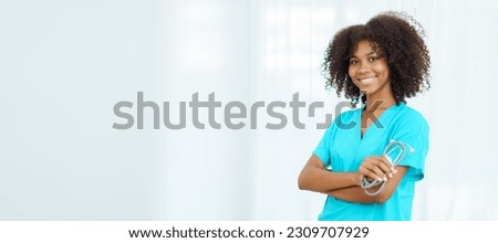 Beautiful American - African black ethnicity female doctor standing in the hospital portrait with copyspace. Surgery female doctor portrait at hospital.