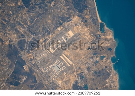 Satellite image of the new Istanbul Airport. Airport photo taken from space with Turkey's northern coast and ports. Airfields and main terminal building. Elements of this image furnished by NASA.