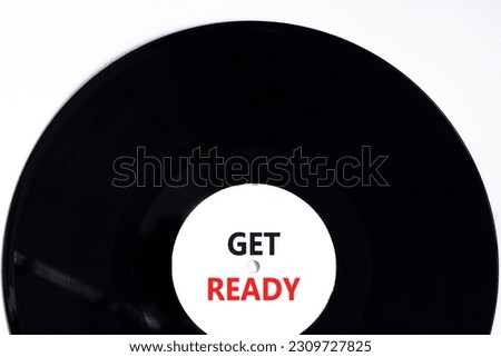 Get ready symbol. Concept words Get ready on beautiful black vinyl disk on a beautiful white table white background. Business, support, motivation and get ready concept. Copy space.