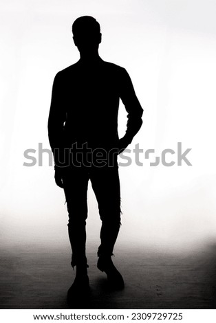 Fashion model posing in front of the camera in the studio