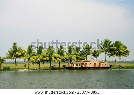 Houseboat in backwater of Alleppey, Kerala, India Royalty-Free Stock Photo #2309743855