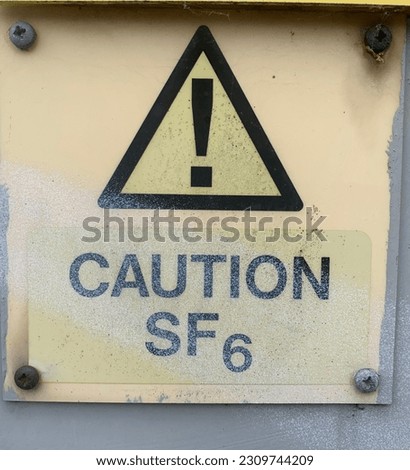 UK yellow warning sign "Caution SF6" an industrial gas commonly used in electrical substations