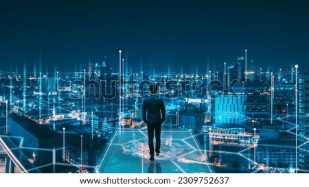 Business technology concept, Professional business man walking on future Pattaya city background and futuristic interface graphic at night, Cyberpunk color style Royalty-Free Stock Photo #2309752637