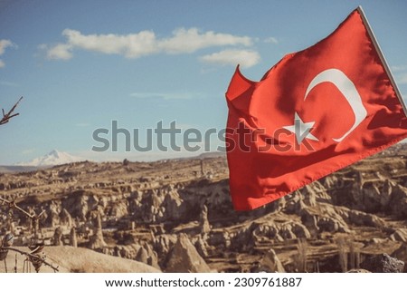 Türkiye, Nevsehir Urgup, Cappadocia landscape, Turkish Flag