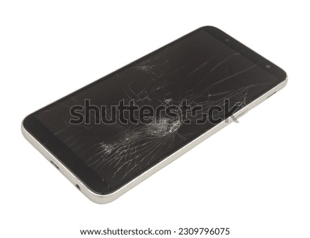 Smartphone with broken screen isolated on white background.