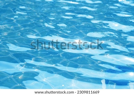 Light reflection Beautiful wave pattern on the ocean surface. Blue background
