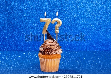 Cupcake With Number For Celebration Of Birthday Or Anniversary; Number 7 And Question Mark