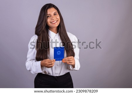 Brazilian businesswoman, with work card. translation in English (Employment Card and Social Security)