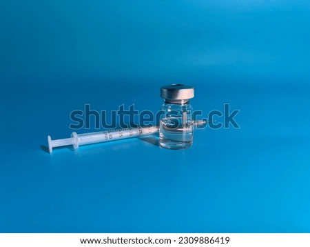 Ampoule and syringe with needle for mesotherapy. Medical agent, drug, vaccine, hyaluronic acid HA, peptides, vitamins and amino acids Royalty-Free Stock Photo #2309886419