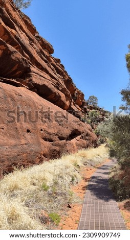 Red outback centre of Australia in Finke Gorge National Park Royalty-Free Stock Photo #2309909749