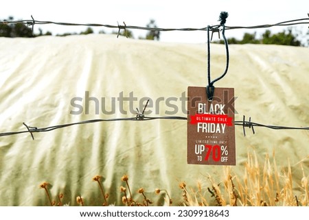 hanging tag with black Friday sale concept with nature background