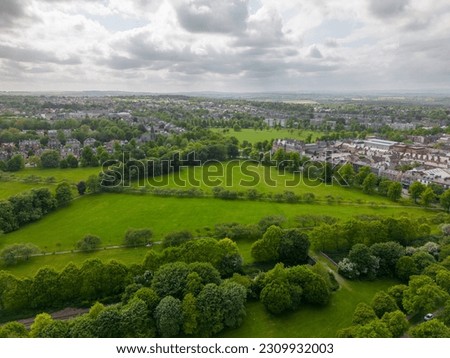 This aerial drone photo shows the beautiful green park in Harrogate in North Yorkshire, England. 
