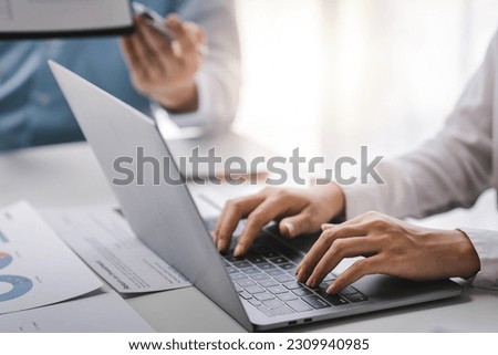 office girl's hands typing input data Royalty-Free Stock Photo #2309940985