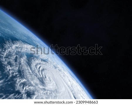 Amazing planet Earth, view from the space. Beautiful Earth and huge hurricane. Typhoon, tropical storm, cyclone, hurricane, tornado, over ocean. Weather background.  Elements furnished by NASA.