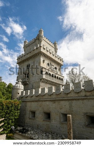 Historic Icon of Lisbon: The Majestic Tower of Belém Rises on the Banks of the Tagus River - Stock Photography that Captures the Architectural Beauty and Charm of Portugal