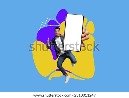 Great App. Cheerful Arab Man Jumping With Big Blank Smartphone And Showing Thumb Up, Happy Middle Eastern Man Demonstrating Empty Cellphone Over Colorful Abstract Background, Collage, Mockup