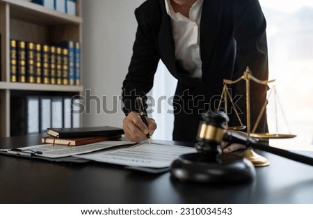 Confident lawyer or businessman examining details in real estate legal contract document Legal service concept, advice, justice.