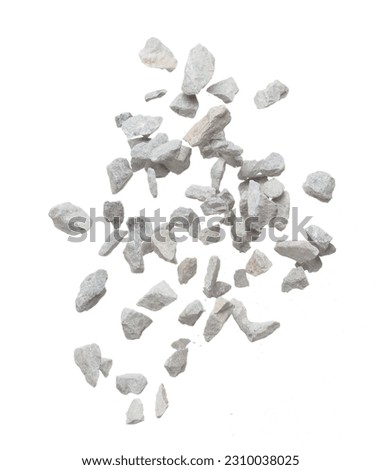 Rock gravel fly explosion fall, gray stone pebbles rock explode abstract cloud fly. Construction rock stone splash in air, object design. White background isolated freeze shot, selective focus blur Royalty-Free Stock Photo #2310038025