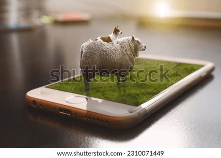 A dog sitting on top of a sheep popping out of an iphone