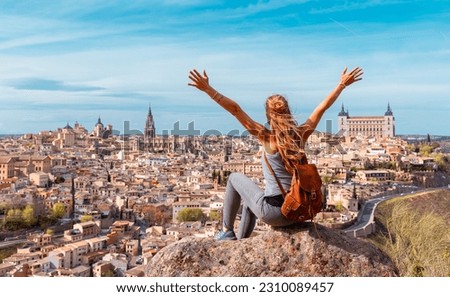 Woman tourist enjoying panoramic view of Toledo city- Castilla la Mancha, Spain Royalty-Free Stock Photo #2310089457