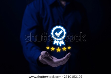 Businessman hand showing check mark digital technology icon symbol. Best quality assurance service concept, product performance assurance, and industry-leading ISO certification.