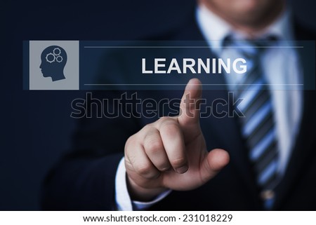 business, technology, internet and networking concept - businessman pressing learning button on virtual screens