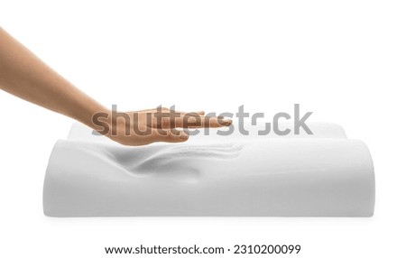 Woman with memory foam pillow on white background, closeup Royalty-Free Stock Photo #2310200099