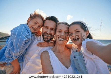 Parents, kids and beach selfie with smile, hug or care in summer sunshine on outdoor holiday. Father, mother and young children with photography, profile picture or together with bond on social media