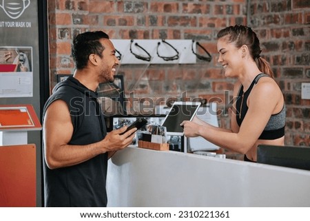 Talking, tablet fitness and an Asian man with a woman for a gym membership and health app. Happy, showing and an exercise club employee with technology for an athlete for training and sports Royalty-Free Stock Photo #2310221361