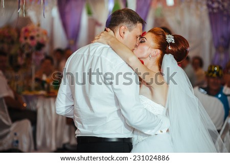 Charming bride and groom dancing on their wedding celebration in a luxurious restaurant. wedding dance of bride and groom