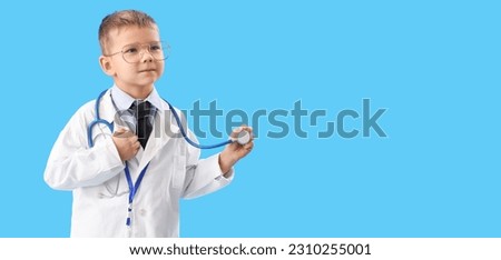 Cute little doctor with stethoscope on light blue background with space for text