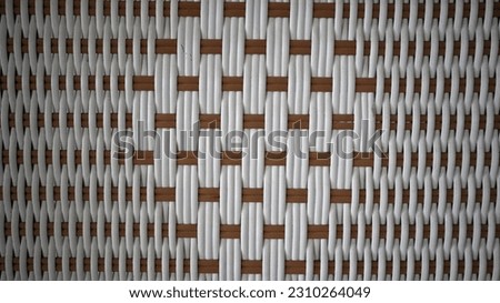 White and brown rattan wood pattern background. Rattan wood is woven for sale as furniture and decoration.