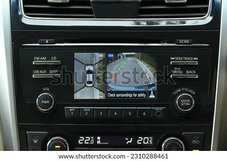 Rear view monitor for reversing system Car display and rear view camera parking assistant car navigation. Royalty-Free Stock Photo #2310288461