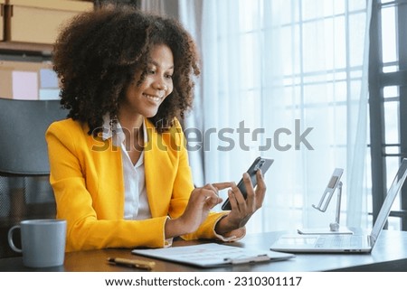 Working smart, African american business woman working audit balance sheet, job order costing, revenue recognition, break-even analysis, appropriated retained earnings, earned surplus, capital gain