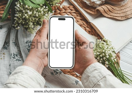 Phone with isolated screen, place for your congratulations, spring decor.