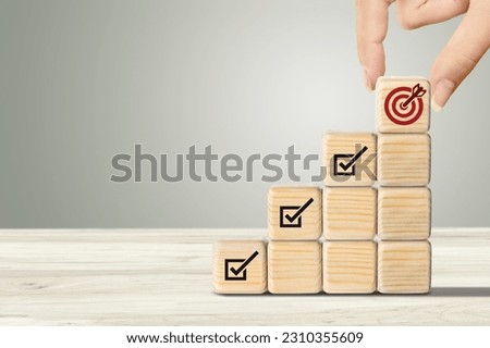 Goals achievement and  success. Wooden cubes set