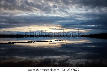 Amazing spring sunset over the lake Markkleeberg