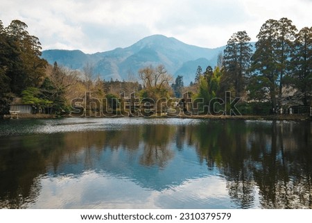 Kyushu, Yufuin, Beautiful winter in lake kinrin, small lake with clear water from a hot spring and Mount Yufu in Sunny day, Oita, Japan.