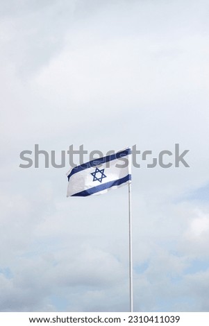 Israel National Flag in Blue Sky. Travel.