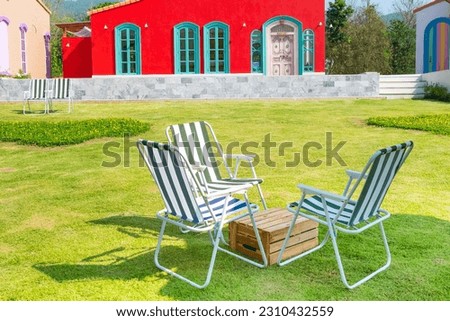 Beach chairs with blue sky.